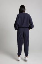 Load image into Gallery viewer, Spodnie dresowe joggery - śliwka efekt skin peach - Chiara Wear
